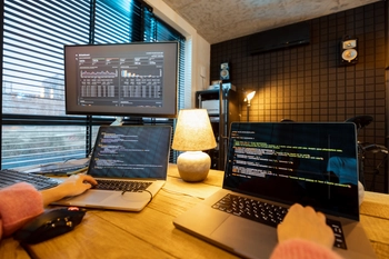 Modern Tech Workspace with Coding Activity