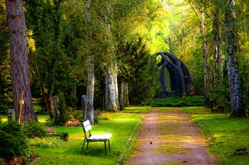 Peaceful Park Path with Sculpture